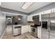 Modern kitchen featuring stainless steel appliances, granite counters and an open concept design at 1718 S Longmore -- # 41, Mesa, AZ 85202