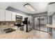 Modern kitchen featuring stainless steel appliances, granite counters and a sliding glass door at 1718 S Longmore -- # 41, Mesa, AZ 85202