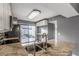 Well-lit kitchen with granite countertops, modern appliances, and seamless outdoor access at 1718 S Longmore -- # 41, Mesa, AZ 85202