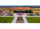 Community park with playground, exercise equipment, picnic tables, and walking paths for residents to enjoy at 17583 W Paraiso Dr, Surprise, AZ 85387