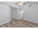 Bedroom with wood-look floors leads to the bathroom at 1822 S 39Th St # 17, Mesa, AZ 85206