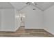 Spacious bedroom showing the entry to the ensuite bathroom, featuring wood-look floors at 1822 S 39Th St # 17, Mesa, AZ 85206