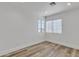 A bright bedroom with modern wood flooring and recessed lighting at 1822 S 39Th St # 17, Mesa, AZ 85206