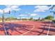 Bright red basketball court on a sunny day at 2034 N Dome Rock --, Mesa, AZ 85207