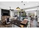 Bright living space with an island, pendant lights, and seamless indoor-outdoor living at 2034 N Dome Rock --, Mesa, AZ 85207