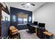 Cozy home office with neutral walls, plush carpet, a work station and a comfortable executive chair at 2034 N Dome Rock --, Mesa, AZ 85207
