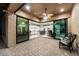 Covered outdoor patio with seamless indoor-outdoor living, featuring sleek sliding glass doors and stylish furnishings at 2034 N Dome Rock --, Mesa, AZ 85207