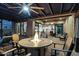 Charming covered patio with a gas fire pit and ample space for entertaining with easy access to the kitchen at 2034 N Dome Rock --, Mesa, AZ 85207