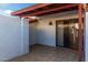 Private patio area with tiled floor, enclosed by walls and sliding glass door for indoor-outdoor living at 2842 E Beck Ln # 2, Phoenix, AZ 85032