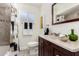 Bathroom featuring a shower/bath combo and vanity at 2902 E Avalon Dr, Phoenix, AZ 85016