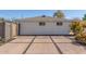 Paver driveway leads up to the two-window facade with a desert-style yard at 2902 E Avalon Dr, Phoenix, AZ 85016