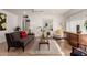 Bright living room with tile floors, neutral paint, and contemporary furnishings at 2902 E Avalon Dr, Phoenix, AZ 85016