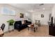 Comfortable living room with tiled floors and ample seating at 2902 E Avalon Dr, Phoenix, AZ 85016