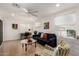 Bright and airy living room with tiled flooring, ceiling fan, and comfortable seating at 2902 E Avalon Dr, Phoenix, AZ 85016