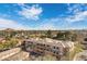 Aerial view of condo complex with beautifully landscaped surroundings and city view at 2989 N 44Th St # 3016, Phoenix, AZ 85018