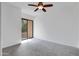 Spacious bedroom with large sliding glass doors to a balcony at 2989 N 44Th St # 3016, Phoenix, AZ 85018