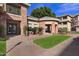 Attractive building exterior with well-maintained landscaping, offering a welcoming entrance to residents and guests at 2989 N 44Th St # 3016, Phoenix, AZ 85018