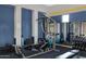 Weight training equipment and blue accents in community fitness center at 2989 N 44Th St # 3016, Phoenix, AZ 85018