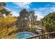 Inviting community pool and spa, surrounded by lush landscaping, provide a resort-style living experience at 2989 N 44Th St # 3016, Phoenix, AZ 85018