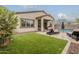 Well-maintained backyard featuring a lush green lawn and a refreshing swimming pool at 3563 E Austin Dr, Gilbert, AZ 85296