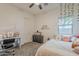 Bright bedroom showcasing a bed, desk, decor, and plenty of natural light at 3563 E Austin Dr, Gilbert, AZ 85296