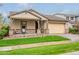 Attractive single-story house with a covered porch and a neatly landscaped front yard at 3563 E Austin Dr, Gilbert, AZ 85296