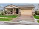 Charming single-story home with a cozy front porch and a well-manicured lawn at 3563 E Austin Dr, Gilbert, AZ 85296