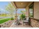 Cozy front porch with comfortable seating and a charming fire pit area at 3563 E Austin Dr, Gilbert, AZ 85296