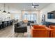 Comfortable living room flowing into the kitchen and dining area, offering ample space for relaxation and entertaining at 3563 E Austin Dr, Gilbert, AZ 85296