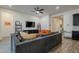 Large living room with a sectional sofa, mounted TV, and modern furnishings at 3563 E Austin Dr, Gilbert, AZ 85296