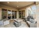Lovely covered patio featuring a stylish seating arrangement, perfect for outdoor relaxation at 3563 E Austin Dr, Gilbert, AZ 85296
