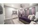 Bright main bedroom with a view of the well-appointed interior, featuring stylish décor at 40195 N Hailey Ln, Queen Creek, AZ 85140