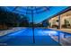 Stunning backyard oasis with pool, elegant patio, lounge chairs, and resort umbrellas at 40195 N Hailey Ln, Queen Creek, AZ 85140