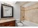 Bathroom featuring granite countertops, tile flooring, and a shower/tub combination at 4436 E Pueblo E Ave, Phoenix, AZ 85040
