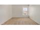 Bright bedroom with carpet flooring, a large window, and neutral paint at 4436 E Pueblo E Ave, Phoenix, AZ 85040