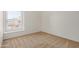 Bedroom with carpet flooring, a large window, and neutral paint at 4436 E Pueblo E Ave, Phoenix, AZ 85040