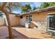 Private backyard patio featuring a stainless steel BBQ grill and a stucco wall at 4530 W Continental Dr, Glendale, AZ 85308