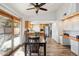 Dining area with wood floors, backyard access, and close proximity to the kitchen at 4530 W Continental Dr, Glendale, AZ 85308