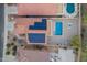 Aerial view of the home, pool, and a full solar panel installation at 4535 W Cottontail Rd, Phoenix, AZ 85086