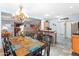 Spacious open-concept dining area with direct access to the kitchen, living room, and second floor at 4535 W Cottontail Rd, Phoenix, AZ 85086