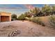 Private backyard offering a patio and desert landscaping at 4937 S Peach Willow Ln, Gilbert, AZ 85298