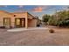 Charming backyard with a covered patio and gravel landscaping at 4937 S Peach Willow Ln, Gilbert, AZ 85298