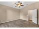 Bedroom with carpet, fan and neutral walls at 4937 S Peach Willow Ln, Gilbert, AZ 85298