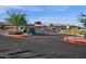Community Golf Cart parking area with easy access to amenities and a variety of golf carts at 4937 S Peach Willow Ln, Gilbert, AZ 85298