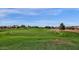 Picture of a sprawling golf course with lush green grass at 4937 S Peach Willow Ln, Gilbert, AZ 85298