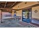 Theatre entrance with covered seating and easy access from sidewalks with stone columns at 4937 S Peach Willow Ln, Gilbert, AZ 85298