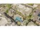 An aerial view highlights the community pool area, nearby parking, and well-maintained landscaping at 5303 N 7Th St # 215, Phoenix, AZ 85014