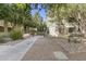 The exterior shows a tranquil setting with sidewalks, landscaping and seating areas at 5303 N 7Th St # 215, Phoenix, AZ 85014