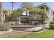The Carlyle Condominium community entrance sign surrounded by lush landscaping at 5303 N 7Th St # 215, Phoenix, AZ 85014