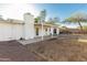 Backyard featuring patio, rock cover, chimney, and access to the house at 638 W 16Th St, Tempe, AZ 85281